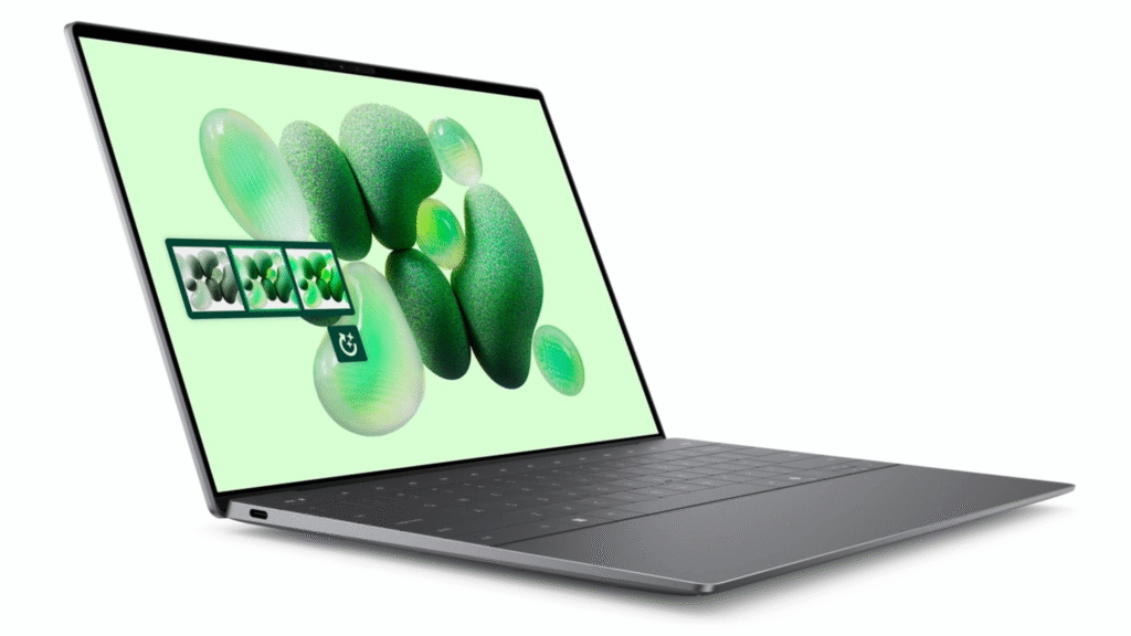 A modern, thin-bezel laptop, likely a Dell XPS 13, is angled to the side, displaying a light green screen with floating 3D organic shapes.