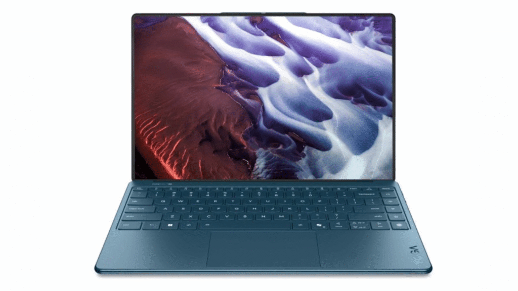 A dark teal or blue Lenovo Yoga 9i laptop with a detachable or 2-in-1 design, displaying an abstract wallpaper of swirling red, purple, and white colors.