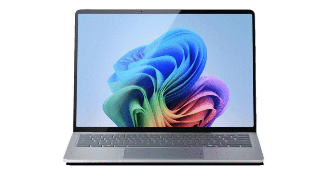 A silver, thin-bezel laptop, likely a Microsoft Surface or similar model, displaying a brightly colored, abstract wallpaper of swirling blue, purple, and rainbow-hued ribbons.