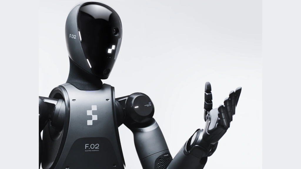 A close-up profile of the Figure 02 humanoid robot, featuring a sleek dark grey metallic body and a black visor.